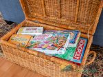 Play a board game with your family. There are plenty in the basket in the living room.